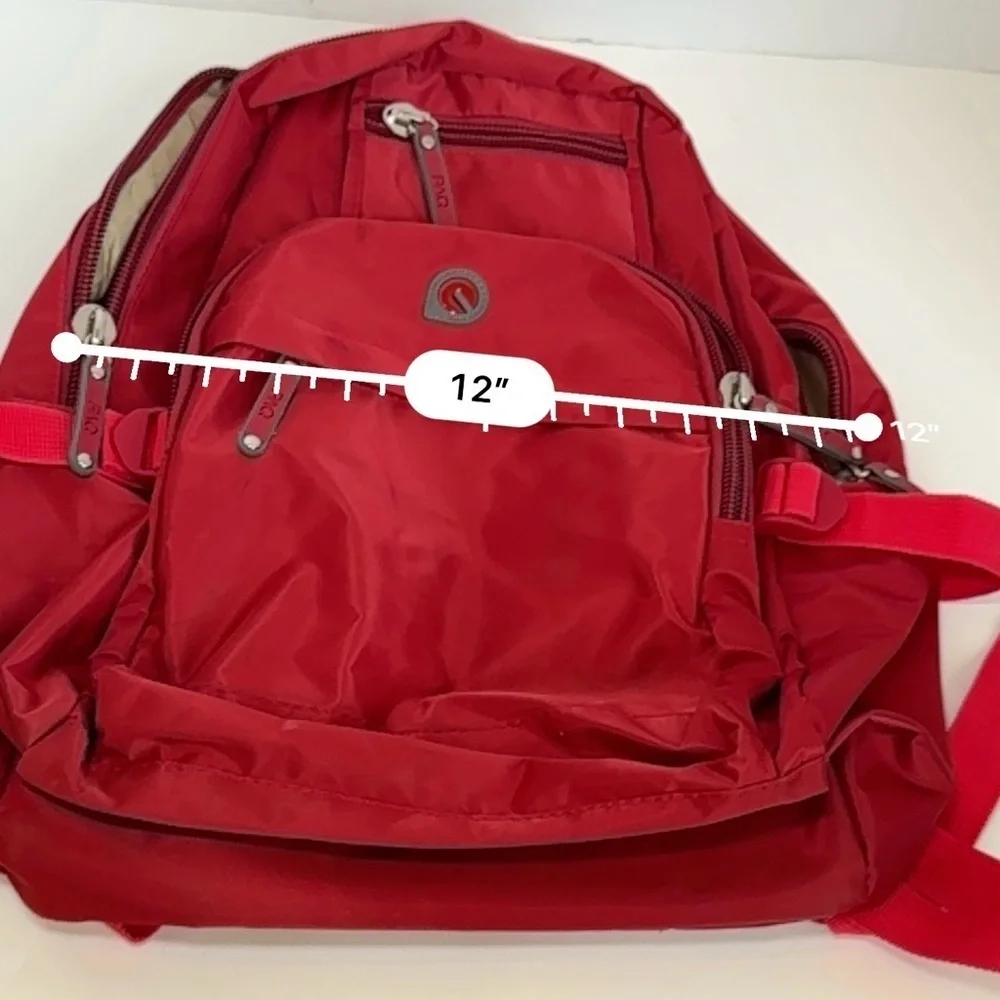PAQ vibrant red backpack in like new condition